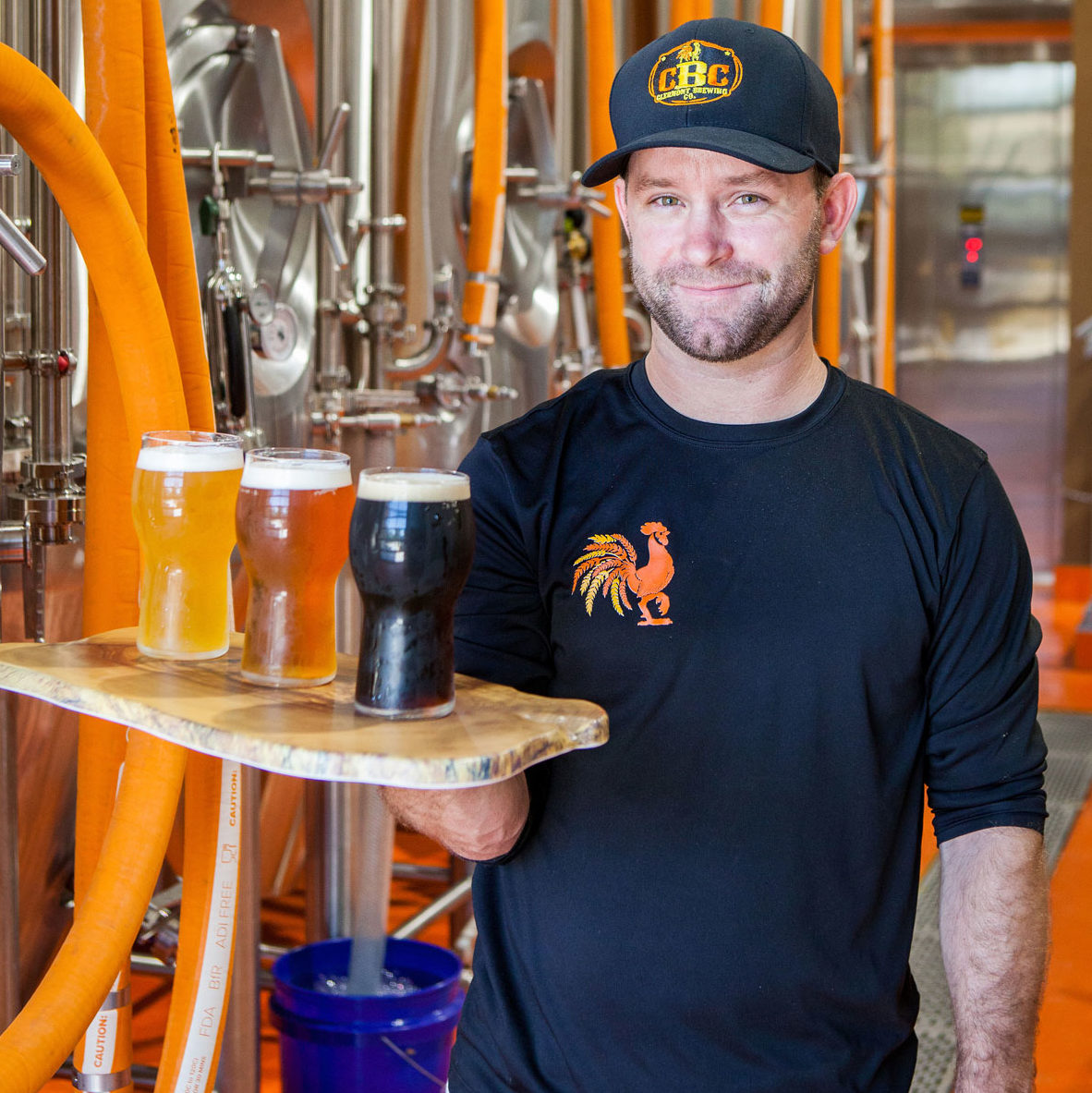 Brewmaster Eric Holding Clermont Brewing Company Pints