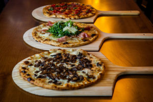 Photo of different pizzas from Clermont Brewing Company