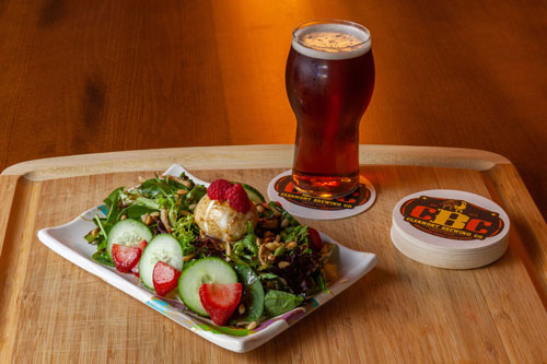 Photo of Salad and Beer from Clermont Brewing Company